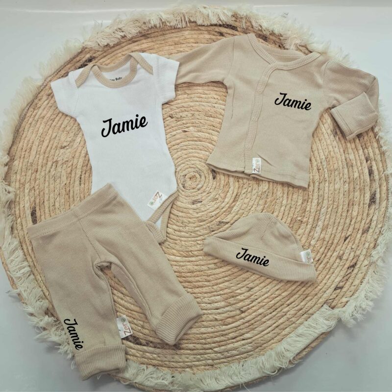 Newborn geboortesetje zand